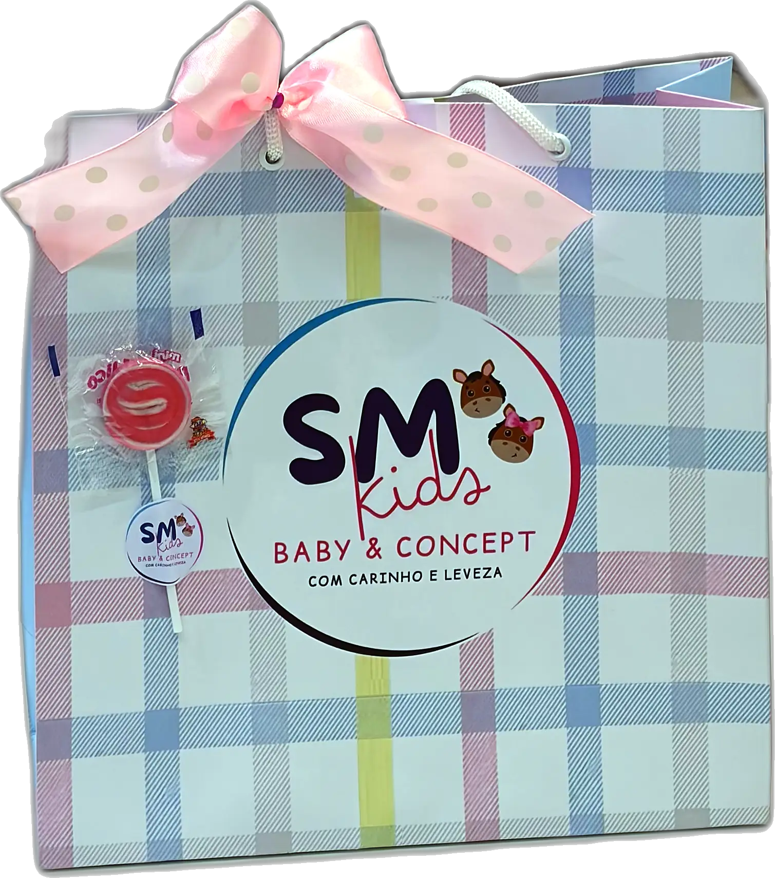 Sacola de presente da SM Kids Baby & Concept com laço rosa e pirulito